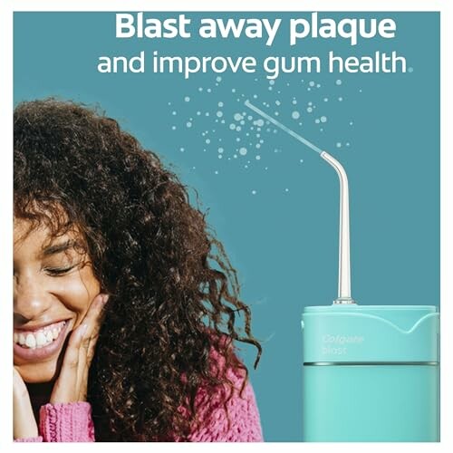 Woman smiling next to a water flosser with text 'Blast away plaque and improve gum health.'